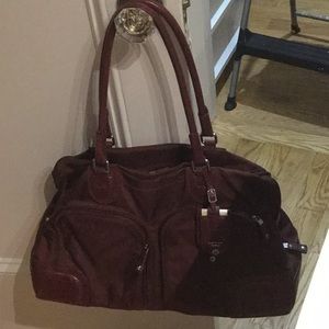 TUMI WEEKENDER CARRY ON shoulder bag.